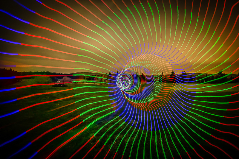 Illustration for article titled Light Paintings That Make the Real World Look like Tron